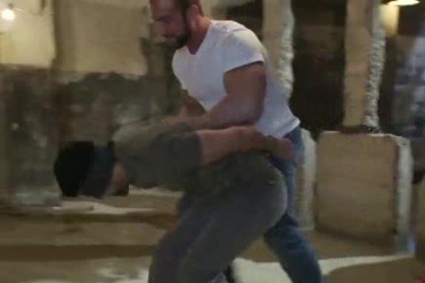 manacled homo gangbang nailed