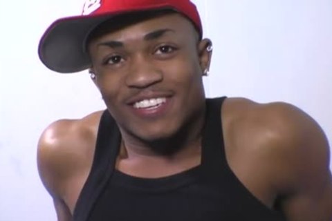 A pumped up darksome chap bonks His friend