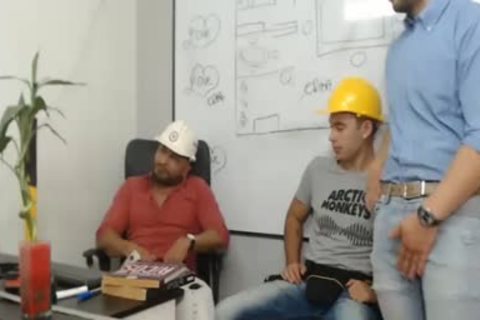 three Workers poke And stroke Each Other