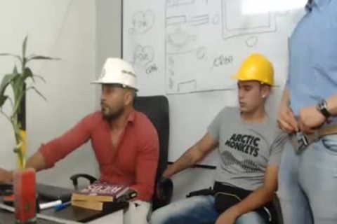 three Workers poke And stroke Each Other